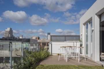 Área de co-working con terraza